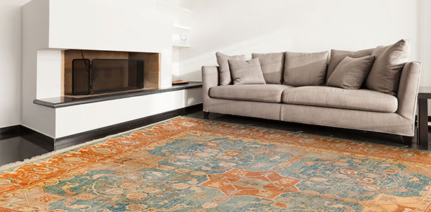 alfombra grande de alfombras hamid bajo un sofá